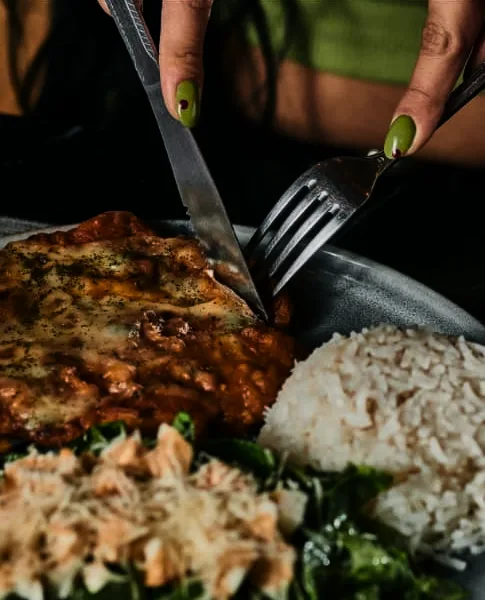Corte de milanesa con arroz